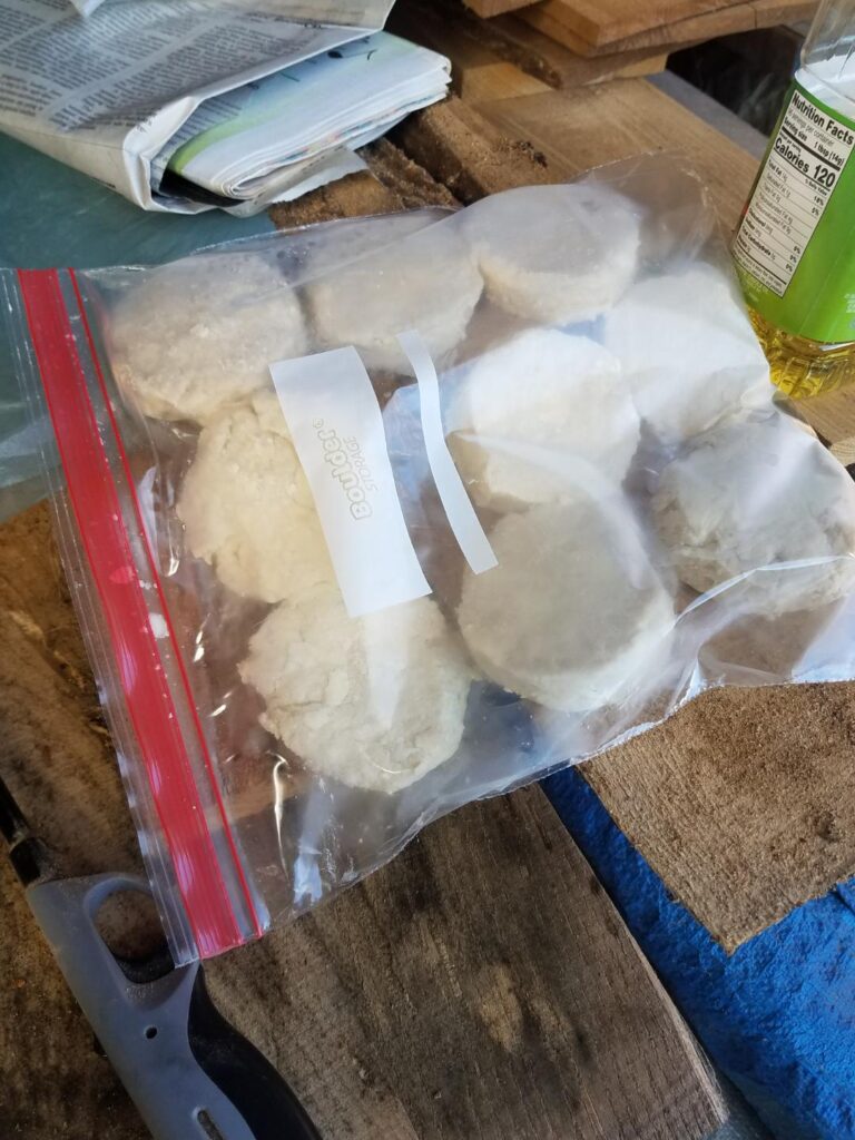 Raw biscuits cut and packed in a zip-top bag for the trip to camp